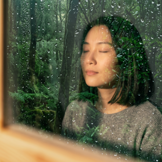 Firefly_Gemini Flash_change the woman to chinese face, put some raindrops on the window glass, window glas 531978
